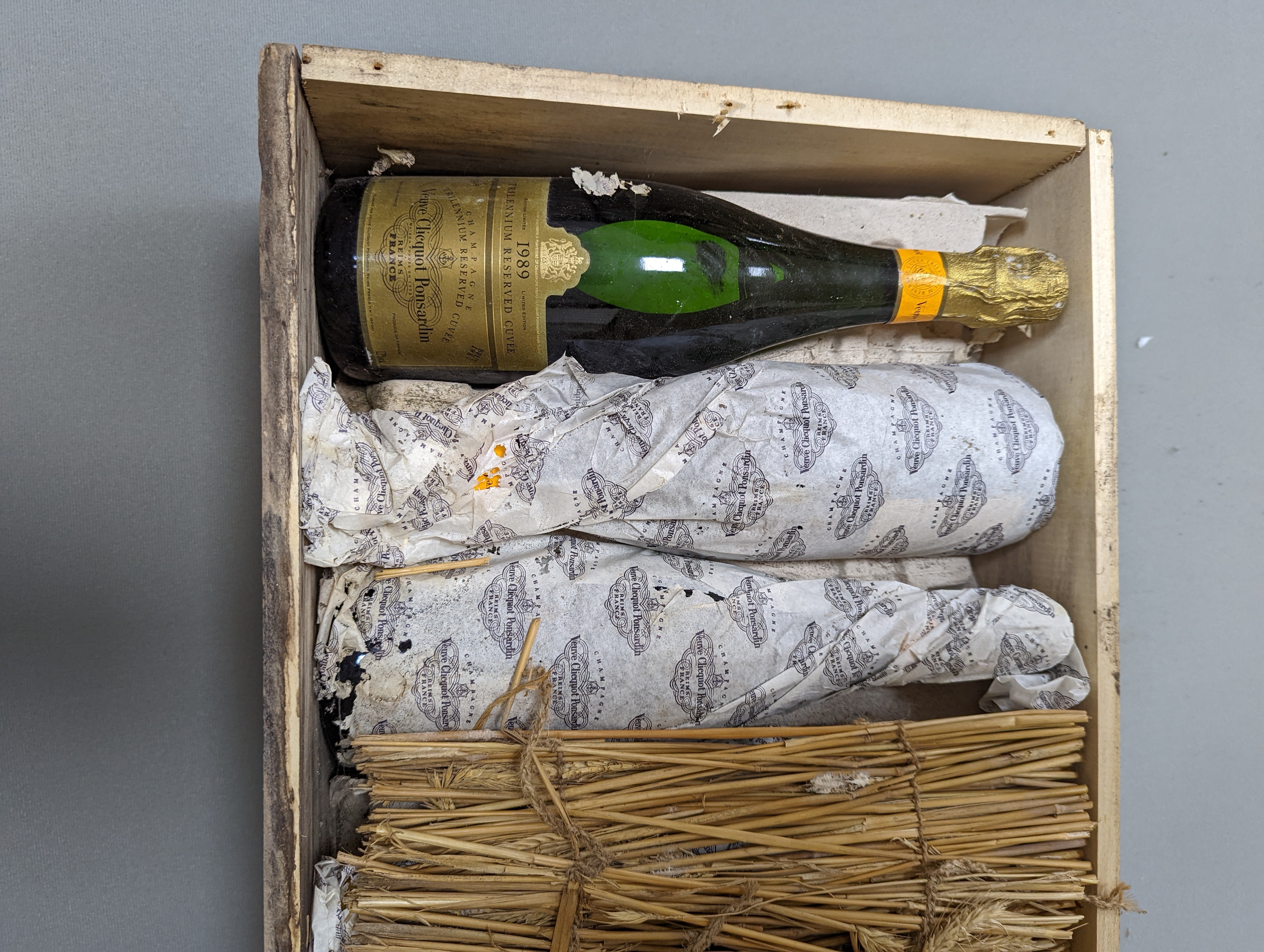 A case of 12 bottles of Veuve Cliquot Trillenium champagne, in OWC.
